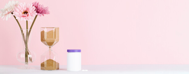 women health concept. medicine, health care style. copy space. white plastic bottle with pills,...
