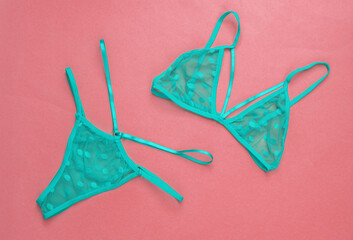 Set of red sexy lingerie on pink background