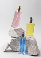 Abstract beauty scene of perfume bottles with stones