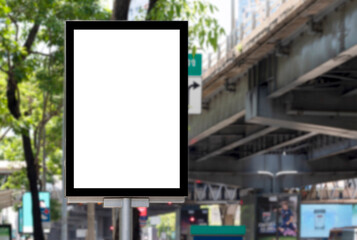 Outdoor pole billboard with mock up white screen on footpath and clipping path - obrazy, fototapety, plakaty