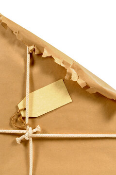 Torn open brown paper parcel background with label transparent background photo PNG file