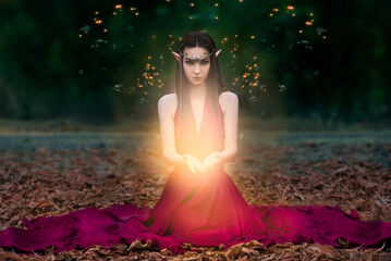 Portrait of a fabulous elven princess with a lantern in a green forest. Night in the forest.