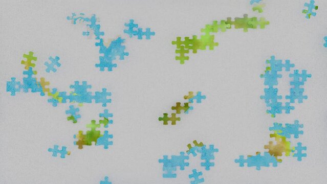 Filmato. Illustrazione 3D. Elementi del Puzzle compongono la mappa del mondo. La cartina geografica piana del nostro pianeta si forma progressivamente fino al completamento..