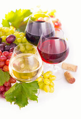 Winemaking. Coast Vineyards. The Grape Harvest. Wine grapes. Glasses of wine and ripe grapes isolated on white