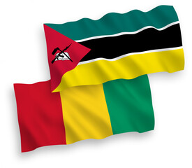 Flags of Republic of Mozambique and Guinea on a white background