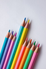 Set of colored pencils, school equipment on the table