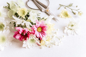 Obraz na płótnie Canvas Making beautiful bouquet at flower shop. Bouquet of different flowers