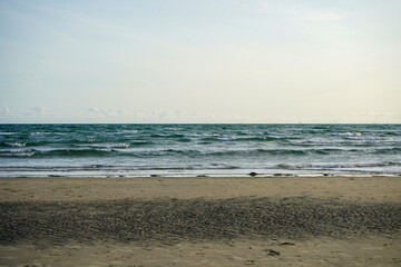 View of the ocean lapping on a sandy shore 