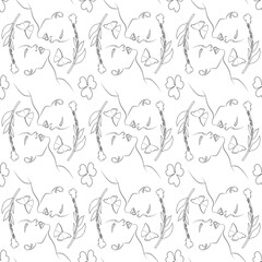 A continuous line drawing with a female face, leaves.