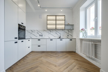 interior of the modern luxure kitchen  in studio apartments with cupboard with lighting