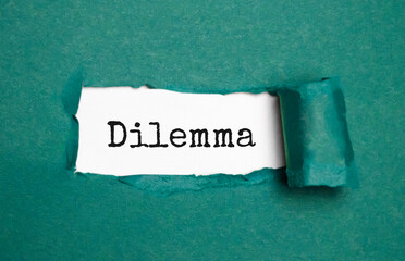 DILEMMA word on white and green torn paper word