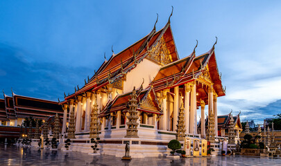 Fototapeta na wymiar Landmark Wat Suthat Buddhist Temple in Bangkok at night