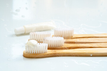 Fototapeta na wymiar Eco-friendly toothbrush with wooden bamboo handle.
