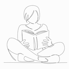 teen girl reads book studying