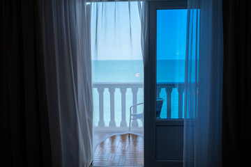 Balcony overlooking the sea. Window overlooking the sea. Endless expanses of the sea. A place for a romantic getaway.