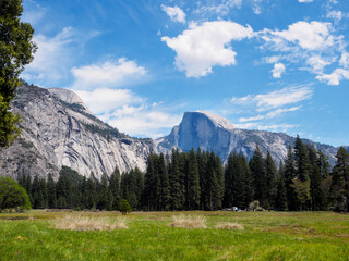 Fototapeta na wymiar Wide angle view of Yosemite nation park, California landscape with sky and clouds