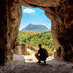backpacker woman looking at beautiful view of puy de dome