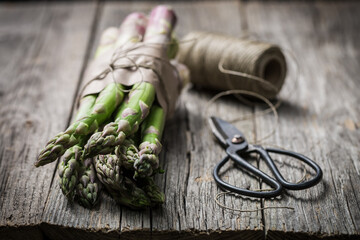 Fresh and spring green asparagus wrapped in string