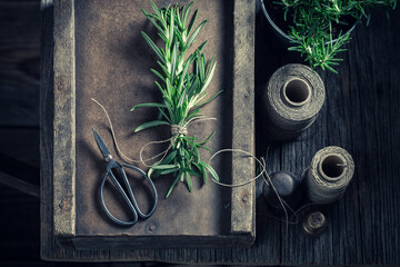 Freshly harvested rosemary in old rustic kitchen.