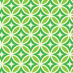 Mid century modern dark green starbursts on lime green circle leaves  seamless pattern. For home décor, textile, fabric and wrapping paper  