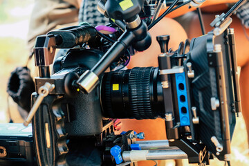 Fototapeta premium Detail image of Cinema Camera on Film Set, Behind the scenes background, film crew production