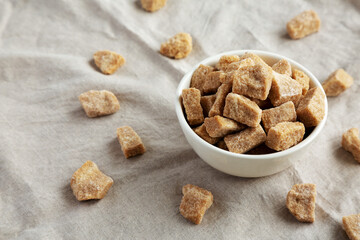 Raw Organic Demerara Granulated Brown Sugar in a Bowl, side view.