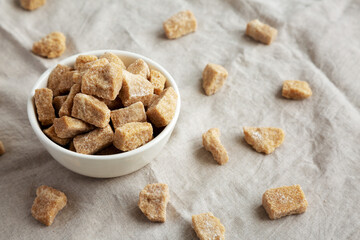 Raw Organic Demerara Granulated Brown Sugar in a Bowl, low angle view.