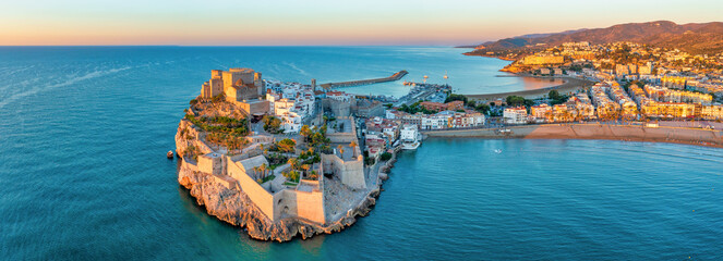 Panoramic view of Peniscola during sunrise, a coastal town in eastern Spain, Costa del Azahar,...
