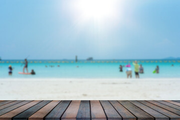 Tourists enjoying the sea and clear skies at Koh Larn, Pattaya, Thailand.