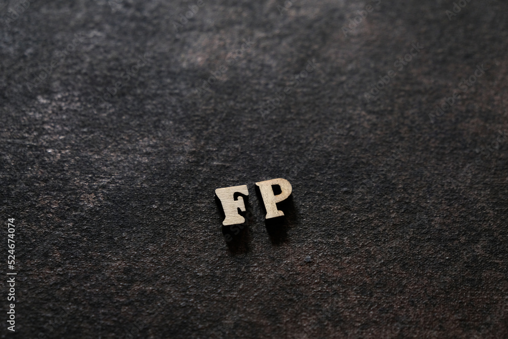 Fototapete the letters f and p above the dark field. initials fp