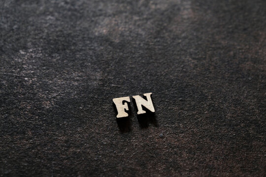 The letters F and N above the dark field. Initials FN