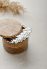 Сotton buds in wooden box