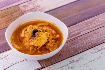Yellow hot sour soup with preserved bamboo shoot and fish