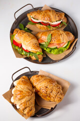 Croissants with various sweet and salty fillings, top view