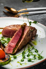 Grilled tuna steak. barbecue fish steak with vegetables. diet vegetarian fish dish, Ketogenic, keto or paleo diet lunch, Top view