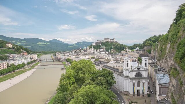 Salzburg Austria time lapse 4K, city skyline timelapse at Salzace River and Fortress Hohensalzburg