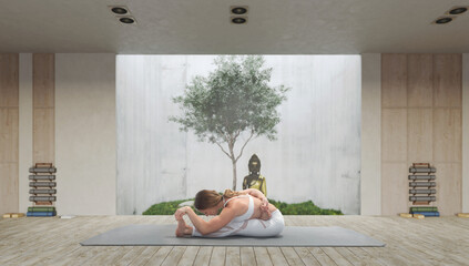 Young athletic attractive woman practicing yoga in a wooden yoga hall.