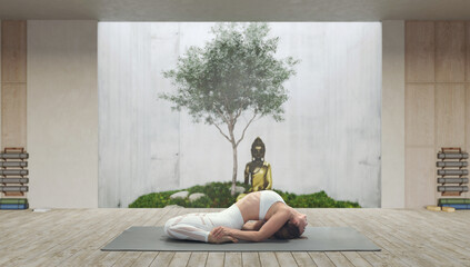 Young athletic attractive woman practicing yoga in a wooden yoga hall.