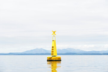 Buoy floating in Firth of Clyde for water depth warning