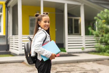 nine years old girl student at school.