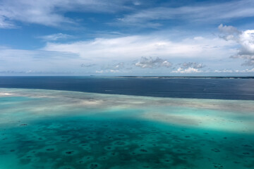 Fototapeta na wymiar Aerial view of turquoise colored ocean and reef in Semporna Sabah Borneo Malaysia