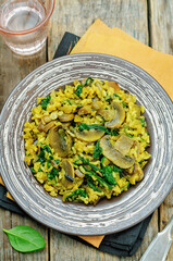 Mushrooms spinach turmeric brown rice in a plate