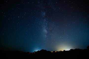 Milky Way. Night sky with stars. Space background. Astro photography in a desert nightscape with...