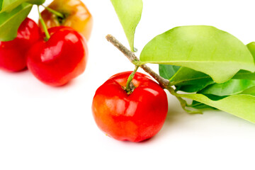 Acerola Cherry or Barbados Cherry with branch and leaf isolated on white background.