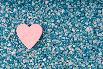 red color heart symbol on blue stones. gems and heart