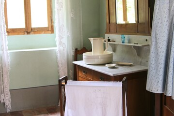 old bedroom with bathroom with towel, lavabo