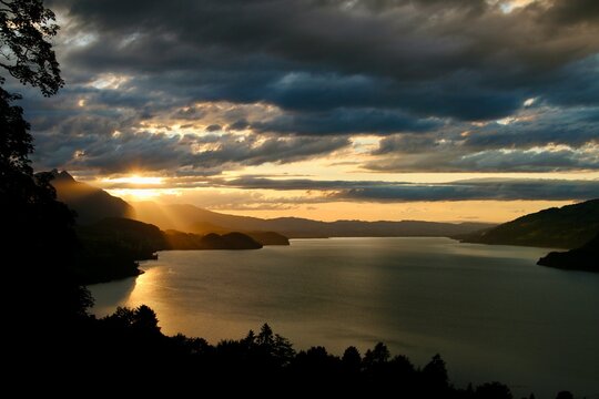 sunset view of lake Thunersee Interlaken, Switzerland