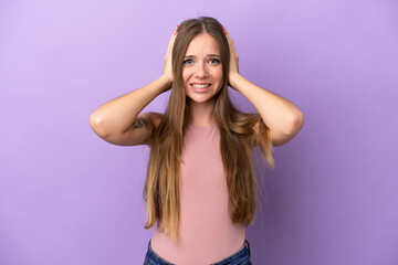 Young Lithuanian woman isolated on purple background doing nervous gesture