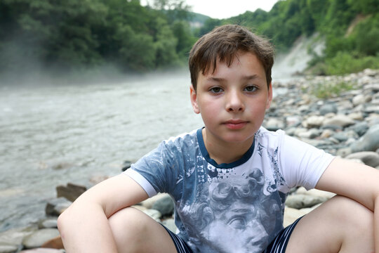 Kid on bank of Belaya River