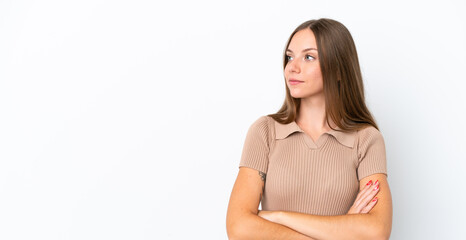 Fototapeta premium Young Lithuanian woman isolated on white background looking to the side